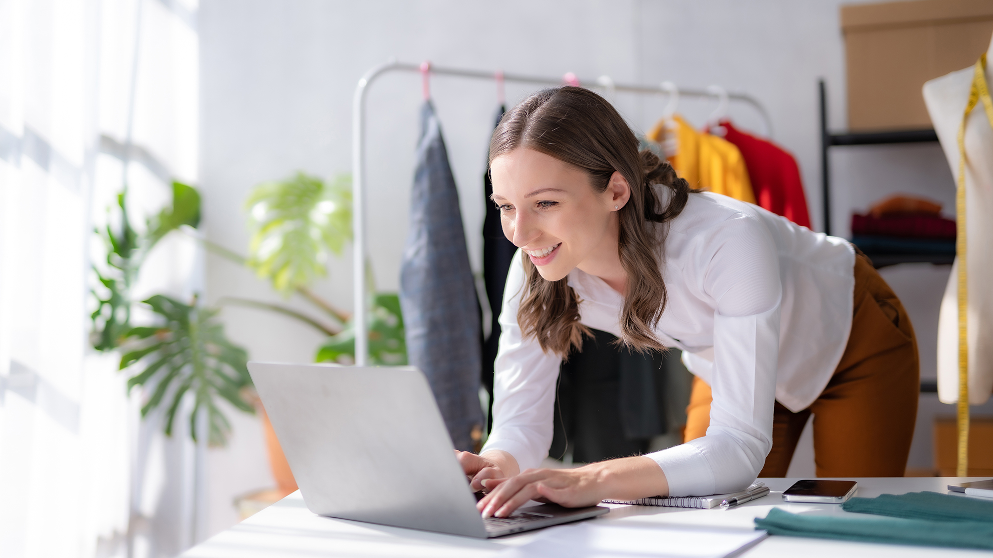 Fashion designer working on computer