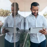 person holding tablet