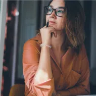 person looking out window