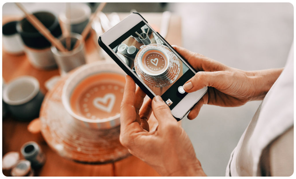 Person taking screen shot of custom bowl for ecommerce social media