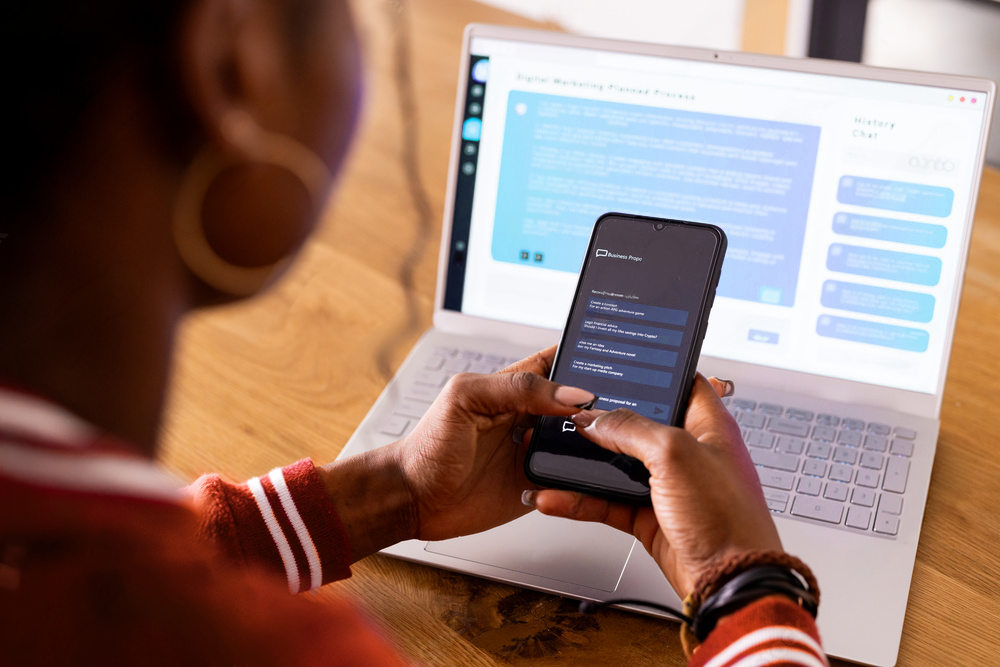 a woman on a cell phone using a chat interface